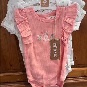 Pearl Pink Ruffled Bodysuit